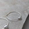 Sliding Heart Silver Hoop Earrings